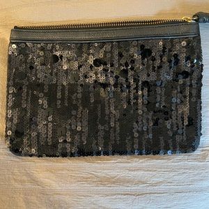 Juicy clutch black sequins bag.